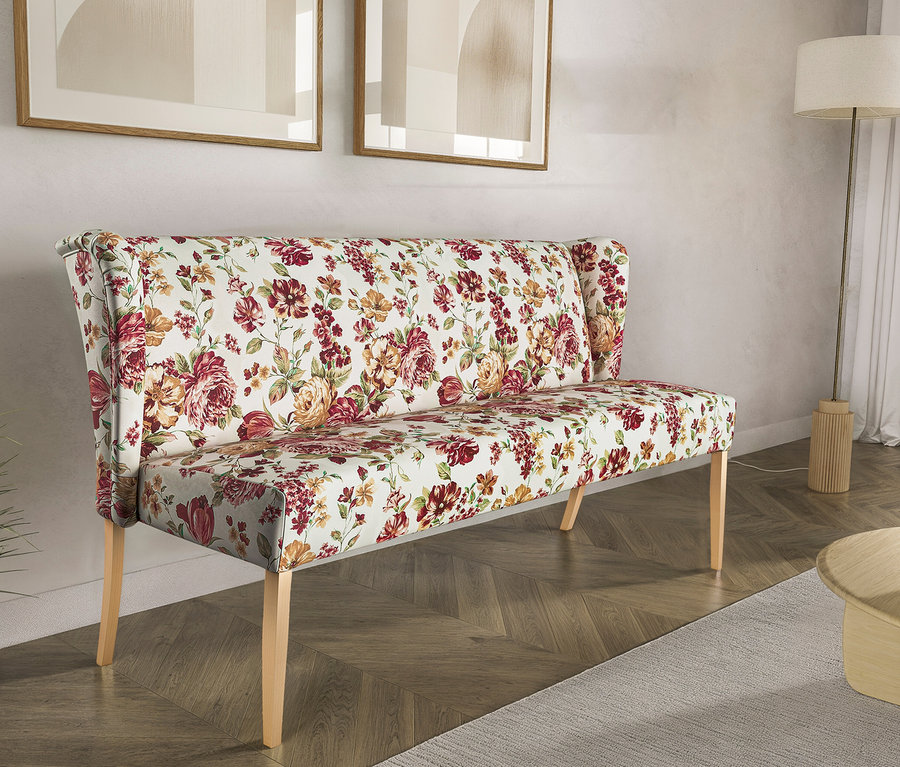 Eine Polsterbank »Hendrick« mit floralem beigem Muster steht im Raum.