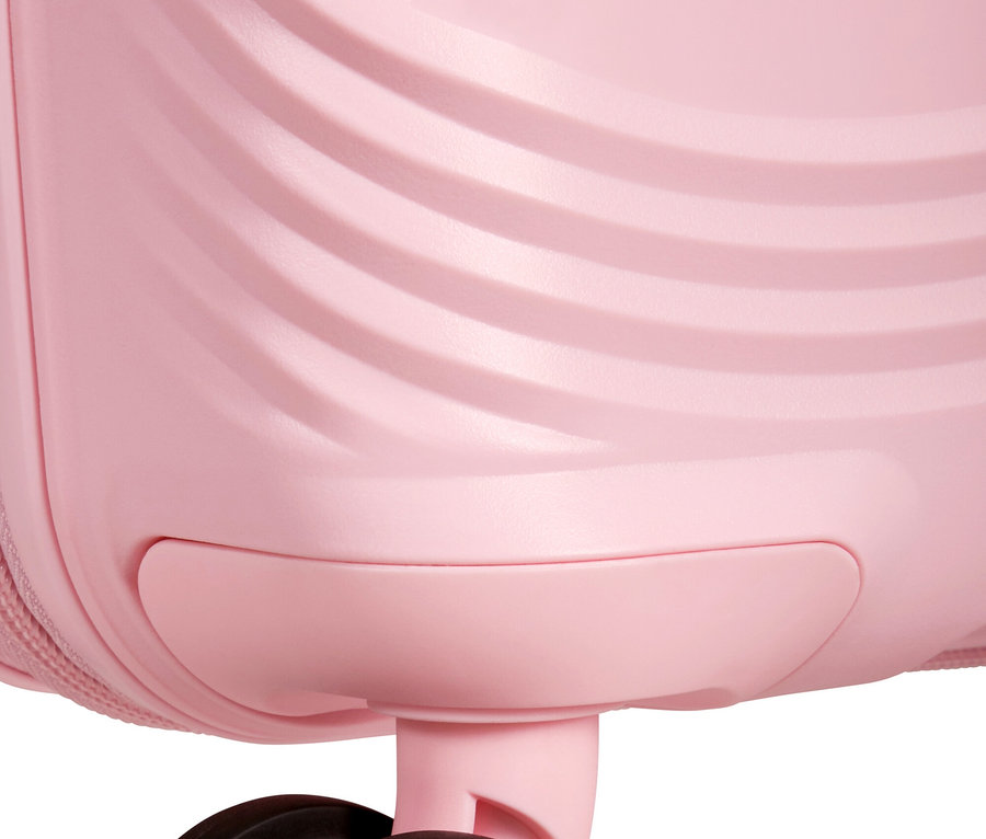 Detailansicht eines rosa American Tourister Koffers mit Rollen.