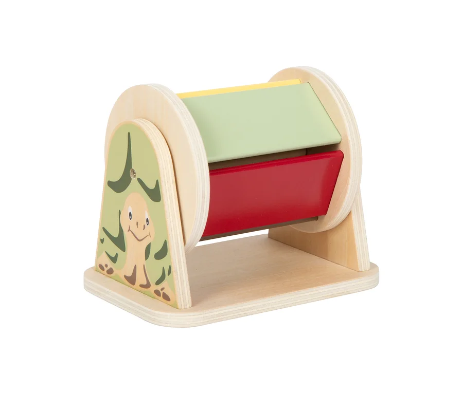 Hölzernes small foot Baby-Rollspielzeug mit farbigen Drehplatten in Rot, Grün und Gelb. Eine Seite ist mit einer lächelnden Schildkröte und Blättern bemalt.