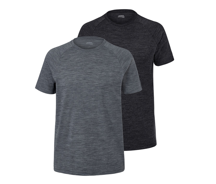 Zwei Funktionsshirts mit Merinowolle liegen übereinander.