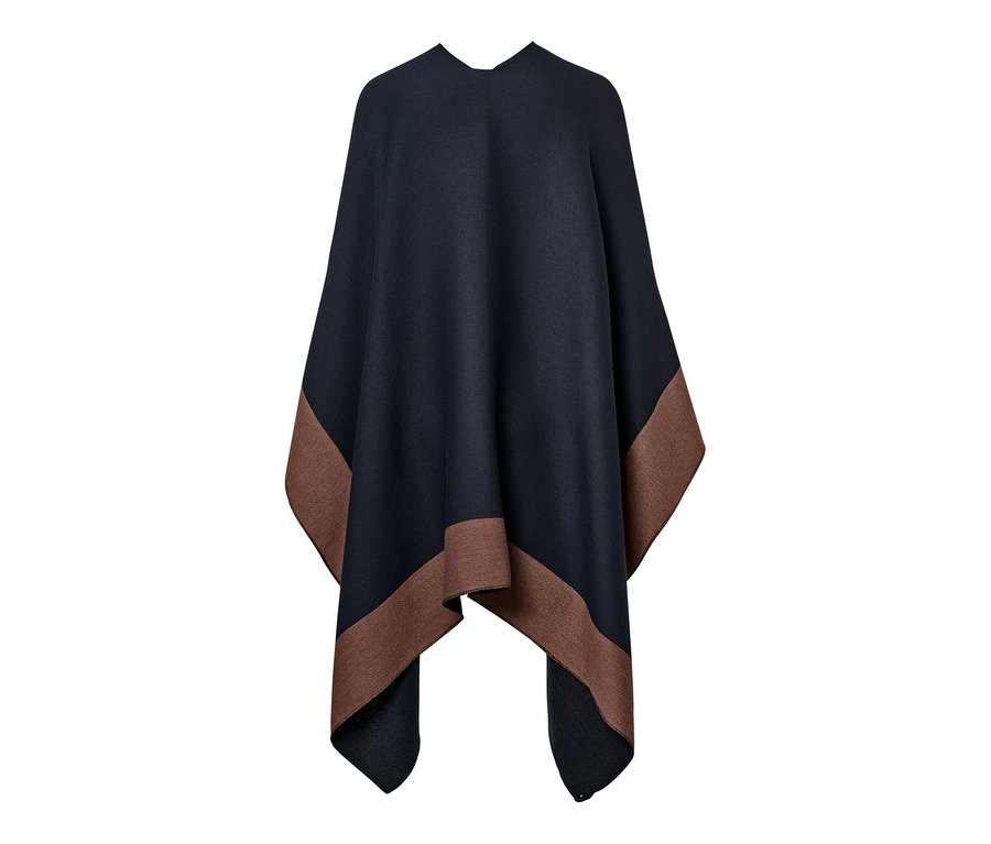 Detailaufnahme eines Wende-Ponchos mit braunem Saum.