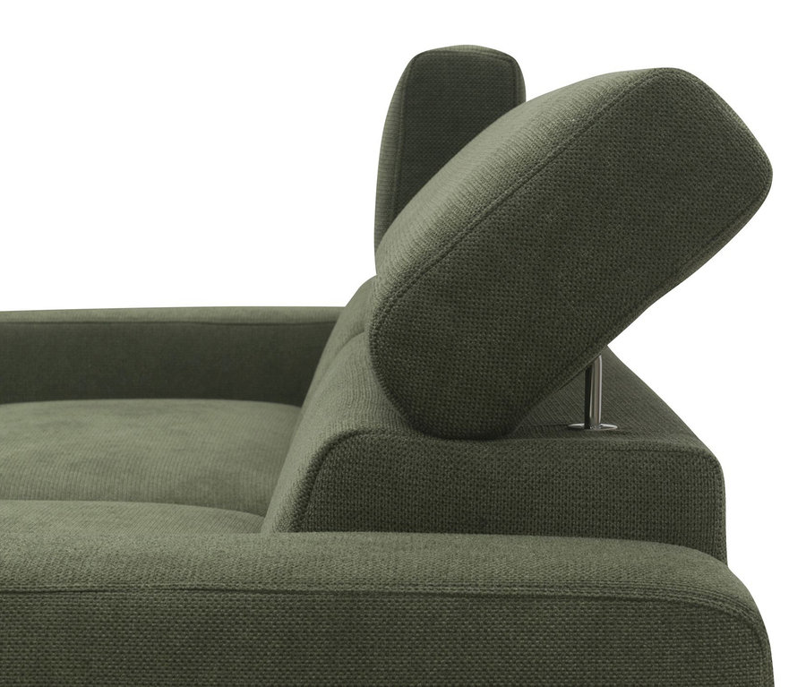 Detailansicht des grünen DOMO collection Sofas, rechts.