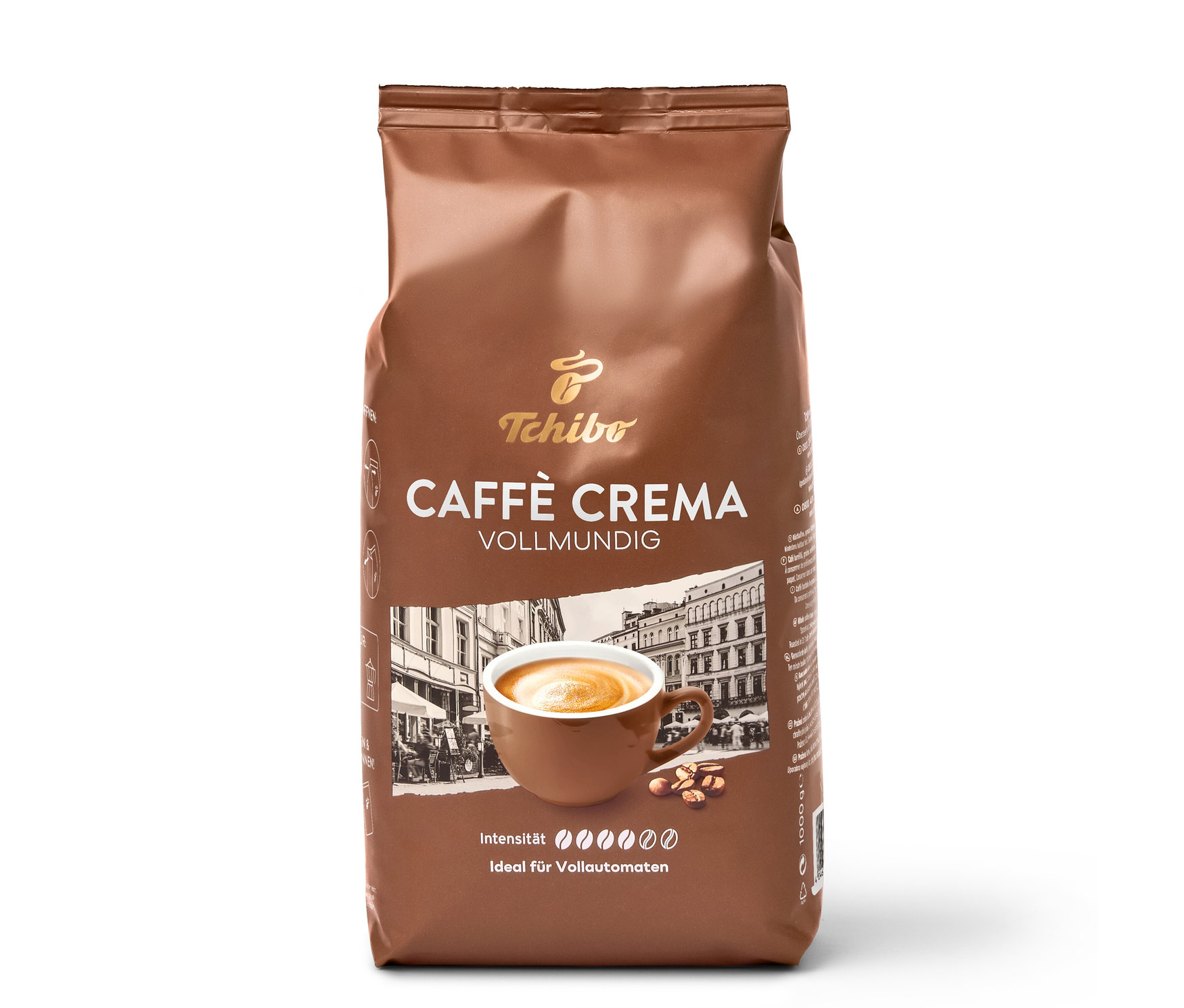 Braune Packung Tchibo Caffè Crema Vollmundig 1 kg Ganze Bohne mit Kaffeetasse, Bohnen und Stadtmotiv. Intensität 4/6, ideal für Vollautomaten.